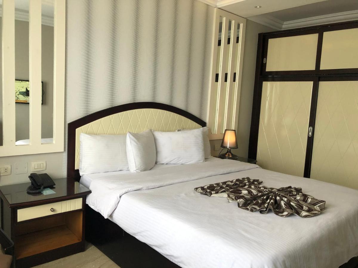 Fleet Club Mahrousa อเล็กซานเดรีย ภายนอก รูปภาพ A bedroom in a hotel