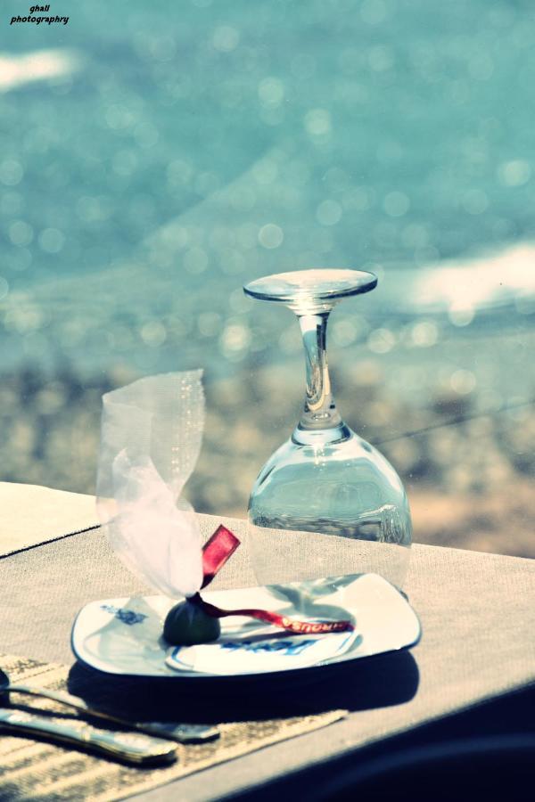 Fleet Club Mahrousa อเล็กซานเดรีย ภายนอก รูปภาพ A wine glass